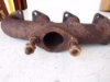 Picture of Kubota 17393-12310 Exhaust Manifold F2803 Engine M4700 Tractor