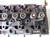 Picture of Kubota 17381-03040 Cylinder Head w/ Valves RUSTY/NEEDS REBUILD