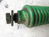 Picture of John Deere FH307566 FH312530 E126629 Roll Tension Spring & Plug 995 994 990 830 835 630 635 500R Moco