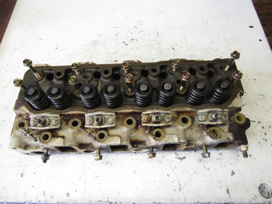 Picture of Cylinder Head off Yanmar 4JHLT-K Marine Diesel Engine