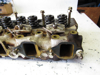 Picture of Cylinder Head off Yanmar 4JHLT-K Marine Diesel Engine