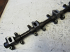 Picture of John Deere DD12121 Rocker Arm Shaft Assy RE19031 RE31973 T20315 T20314