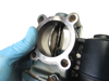 Picture of Kubota 1J770-10600 Throttle Body off V2607-CR-T-EF08
