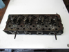 Picture of Kubota 1J705-03030 Cylinder Head NEEDS WORK off V2607-CR-T-EF08 1J705-03032