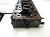 Picture of Kubota 1J705-03030 Cylinder Head NEEDS WORK off V2607-CR-T-EF08 1J705-03032