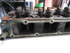 Picture of Kubota 1J705-03030 Cylinder Head NEEDS WORK off V2607-CR-T-EF08 1J705-03032