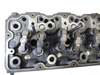 Picture of Kubota 1J770-03030 Cylinder Head w/ Valves to certain V3307 engine 1J770-03034 1J770-03035 1J775-03030