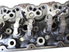 Picture of Kubota 1J770-03030 Cylinder Head w/ Valves to certain V3307 engine 1J770-03034 1J770-03035 1J775-03030