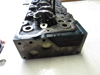 Picture of Kubota 1J770-03030 Cylinder Head w/ Valves to certain V3307 engine 1J770-03034 1J770-03035 1J775-03030