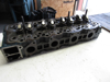 Picture of Kubota 1J770-03030 Cylinder Head w/ Valves to certain V3307 engine 1J770-03034 1J770-03035 1J775-03030