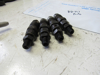Picture of 4 Kubota 16419-53900 Fuel Injectors to certain V2403-M engine FOR PARTS 16419-53905