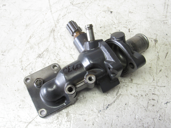 Picture of Kubota 16394-72702 Thermostat Housing Water Flange & Cover off D1105-E 16219-73260