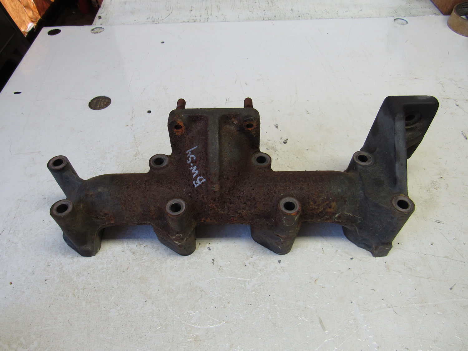 Eastern Triangle Enterprises LLC EStore. Exhaust Manifold off Yanmar 4TNV88BDSA2 Diesel Engine