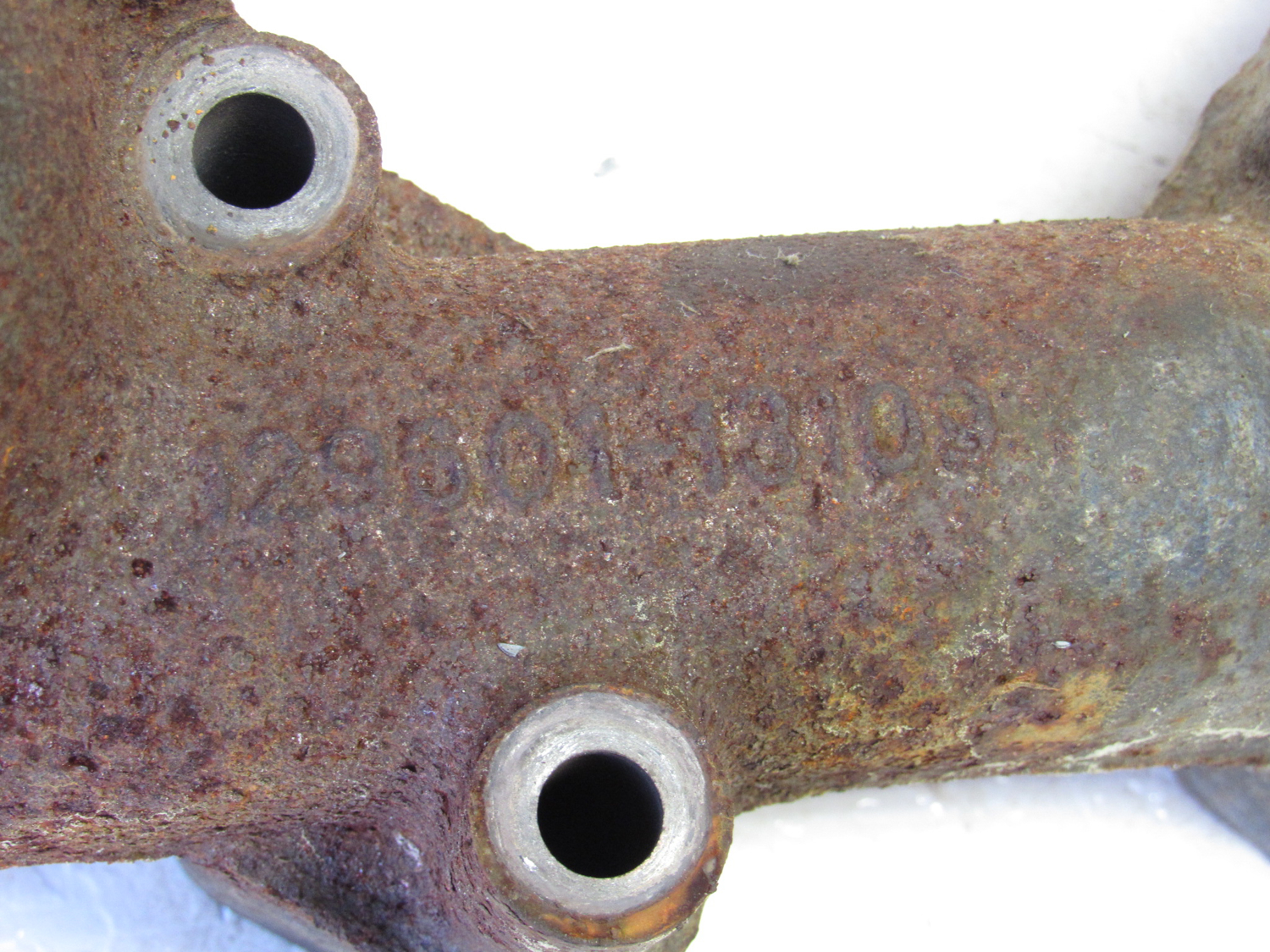 Eastern Triangle Enterprises LLC EStore. Exhaust Manifold off Yanmar 4TNV88BDSA2 Diesel Engine