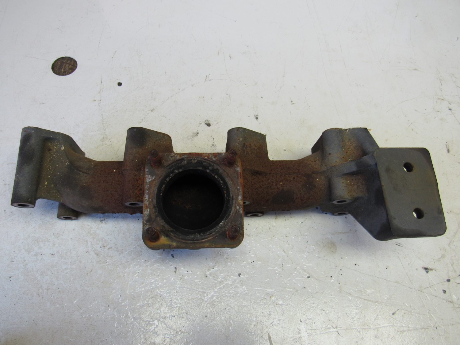 Eastern Triangle Enterprises LLC EStore. Exhaust Manifold off Yanmar 4TNV88BDSA2 Diesel Engine