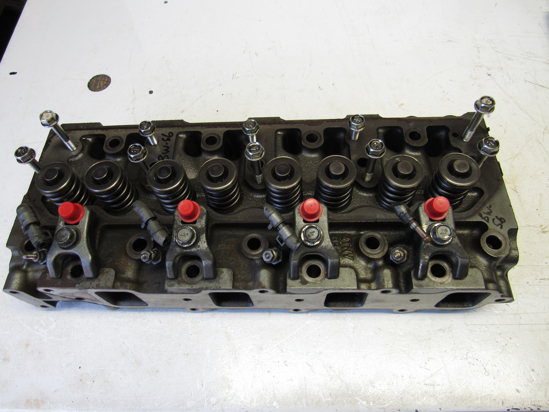 Picture of Cylinder Head w/ Valves off Yanmar 4TNV88-BDSA2 Diesel Engine