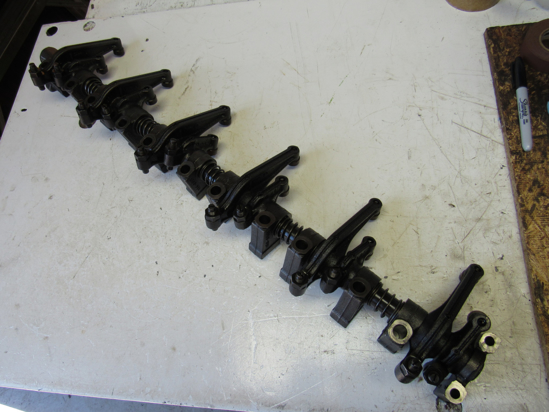 Picture of Cat Caterpiller 153-8471 153-8468 138-8401 138-8402 138-8403 Rocker Arm Shaft Assy to certain 3126 Engine