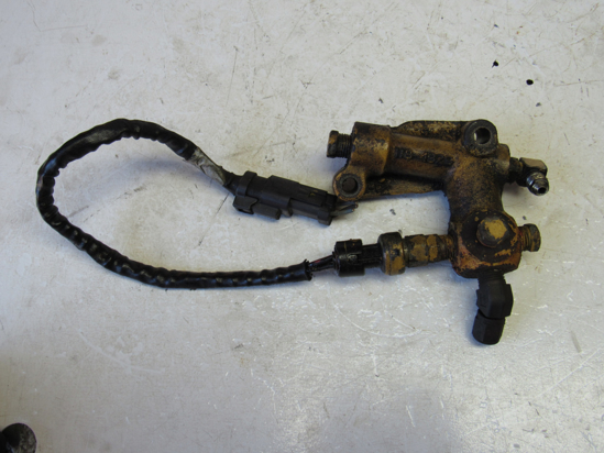 Picture of Cat Caterpiller 118-4329 Oil Valve Manifold to certain 3126 Engine 1184329
