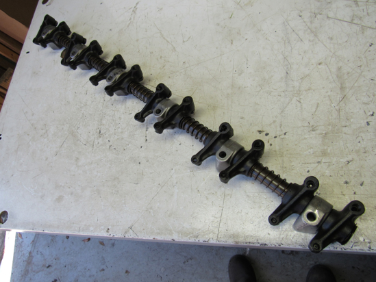 Picture of John Deere T20465 R54986 Rocker Arm Shaft Assy AT31250 T20315 DD12121 RE19031