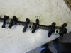 Picture of John Deere T20465 R54986 Rocker Arm Shaft Assy AT31250 T20315 DD12121 RE19031
