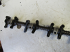 Picture of John Deere T20465 R54986 Rocker Arm Shaft Assy AT31250 T20315 DD12121 RE19031