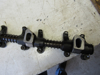 Picture of John Deere T20465 R54986 Rocker Arm Shaft Assy AT31250 T20315 DD12121 RE19031
