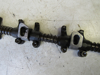 Picture of John Deere T20465 R54986 Rocker Arm Shaft Assy AT31250 T20315 DD12121 RE19031