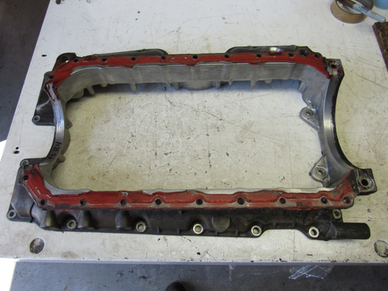 Picture of Cylinder Block Oil Pan Spacer off 2002 Isuzu D201 ThermoKing Diesel Engine