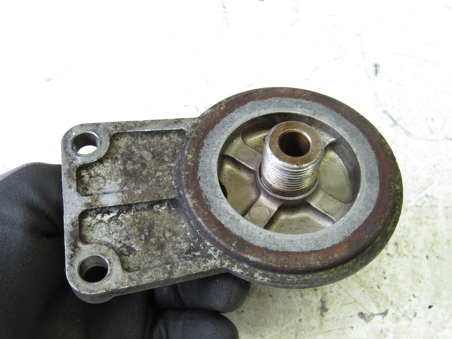 Eastern Triangle Enterprises LLC EStore. Fuel Filter Head Housing to certain Kubota V1305E Engine