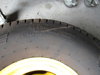 Picture of Carlisle Ultra Trac 26.5x14.00-12 Tire & Rim off John Deere 7500 7700 8500 8700 Mower