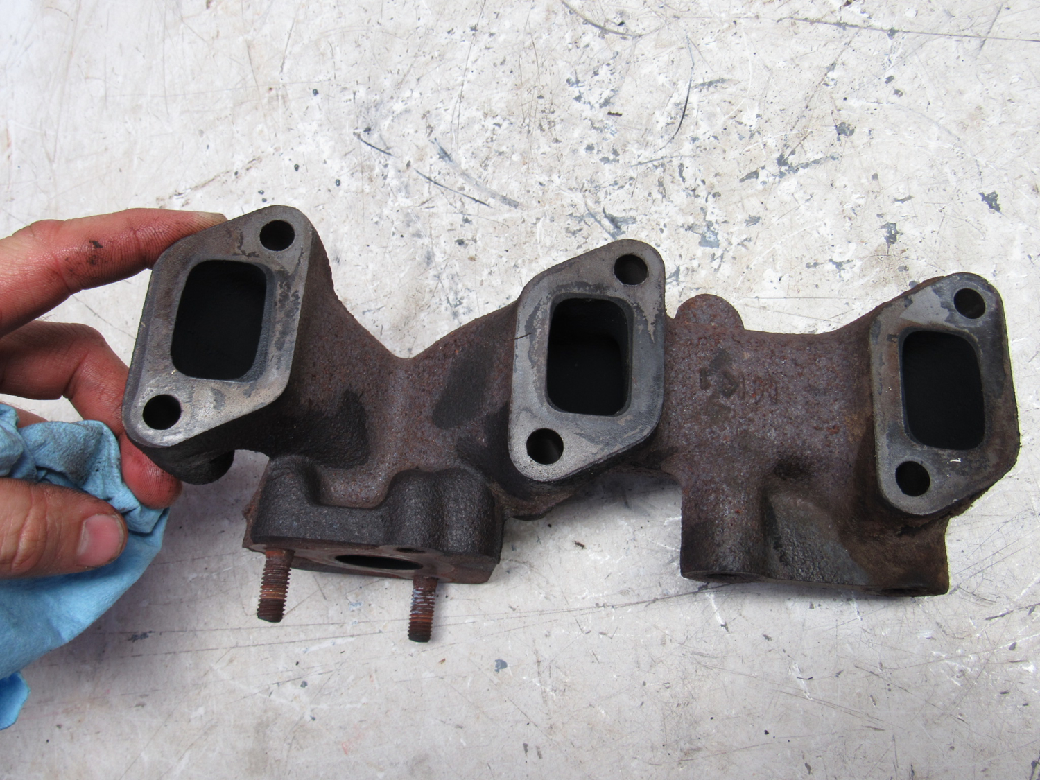 Eastern Triangle Enterprises LLC EStore. Exhaust Manifold M811492 John Deere Yanmar 3TNV84T