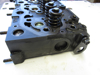 Picture of Kubota 1A013-03043 Cylinder Head w/ Valves to certain D1503 1A013-03044