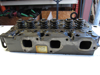 Picture of Kubota 1A013-03043 Cylinder Head w/ Valves to certain D1503 1A013-03044