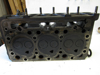 Picture of Kubota 1A013-03043 Cylinder Head w/ Valves to certain D1503 1A013-03044