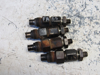 Picture of 4 Case H659508 Fuel Injectors off Mitsubishi 4DQ5 DH4B Trencher