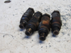 Picture of 4 Case H659508 Fuel Injectors off Mitsubishi 4DQ5 DH4B Trencher