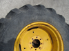 Picture of 2 John Deere AT309102 Wheels 24x15L w/ Firestone 16.9-24 Tires off 300D Backhoe