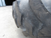 Picture of 2 John Deere AT309102 Wheels 24x15L w/ Firestone 16.9-24 Tires off 300D Backhoe