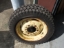 Picture of Carlisle 24x8.50-14 Multi Trac C/S Tire on John Deere LVA16435 Rim