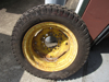 Picture of Carlisle 24x8.50-14 Multi Trac C/S Tire on John Deere LVA16435 Rim