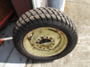 Picture of Carlisle 24x8.50-14 Multi Trac C/S Tire on John Deere LVA16435 Rim