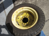 Picture of Carlisle 24x8.50-14 Multi Trac C/S Tire on John Deere LVA16435 Rim