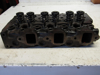 Picture of John Deere AM875307 Cylinder Head w/ Valves