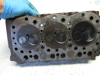 Picture of John Deere AM875307 Cylinder Head w/ Valves